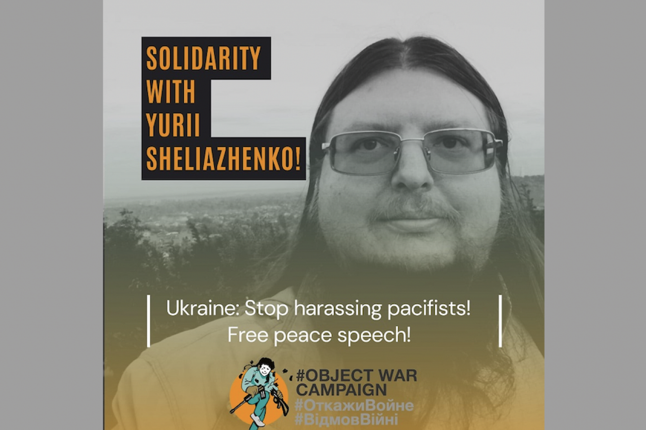 Juri Sheliazhenkon kuva. Teksti: Solidarity with Yurii Sheliazhenko! Ukraine: Stop harassing pacifists! Free speech!